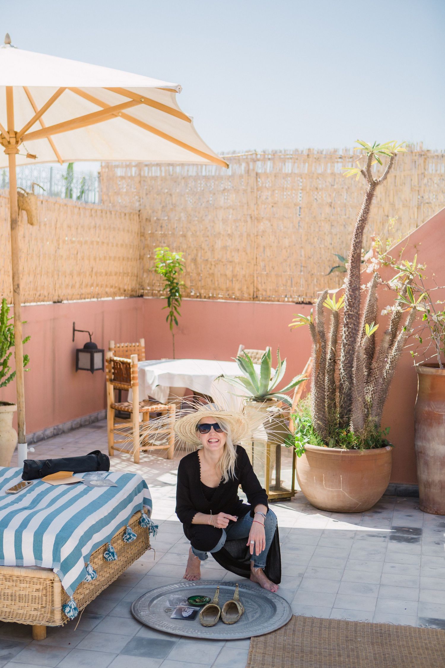 Elaine From Dust and Dreams Photography working on a rooftop in Marrakech.