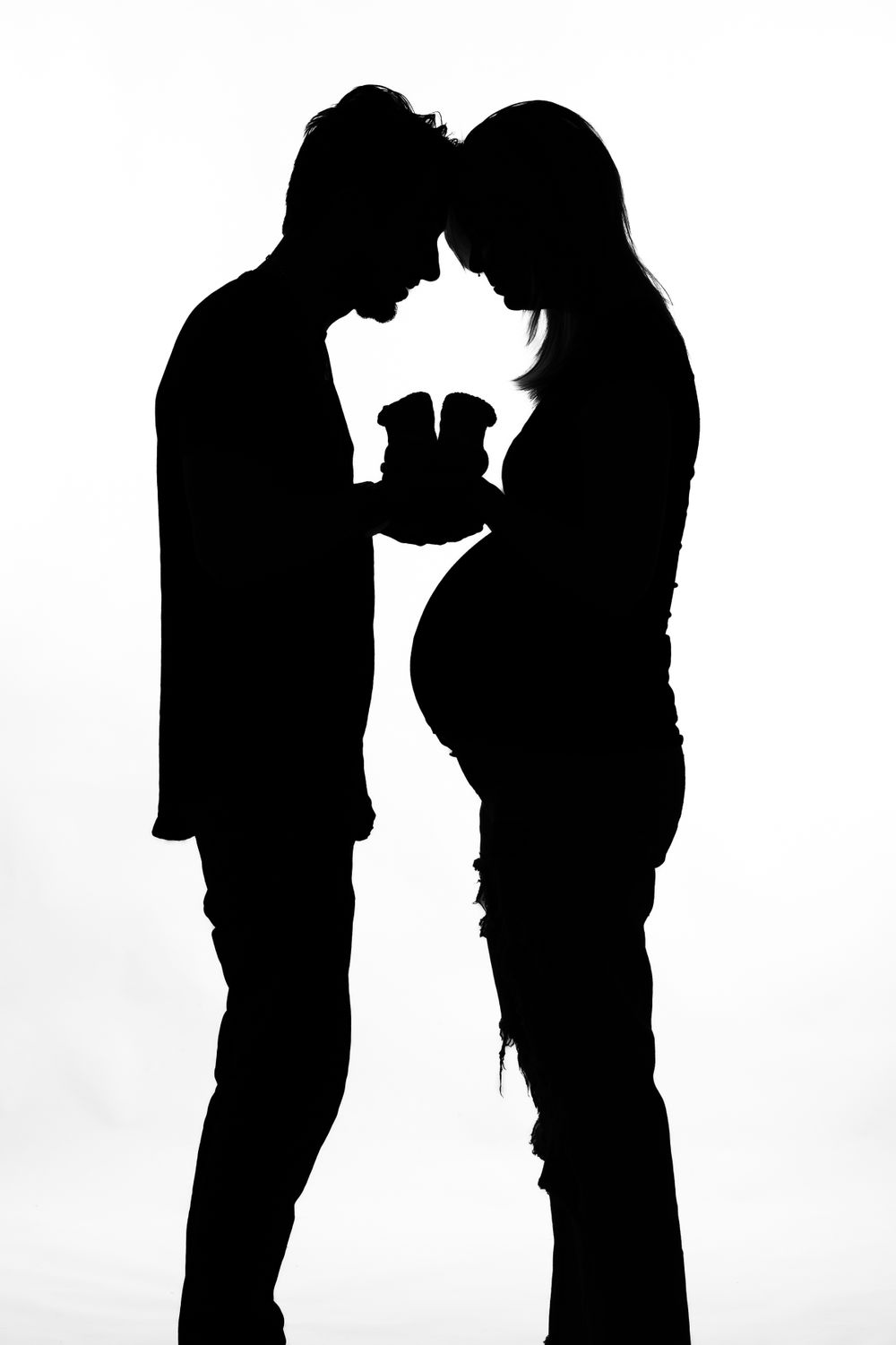 Silhouette de couple avec femme enceinte