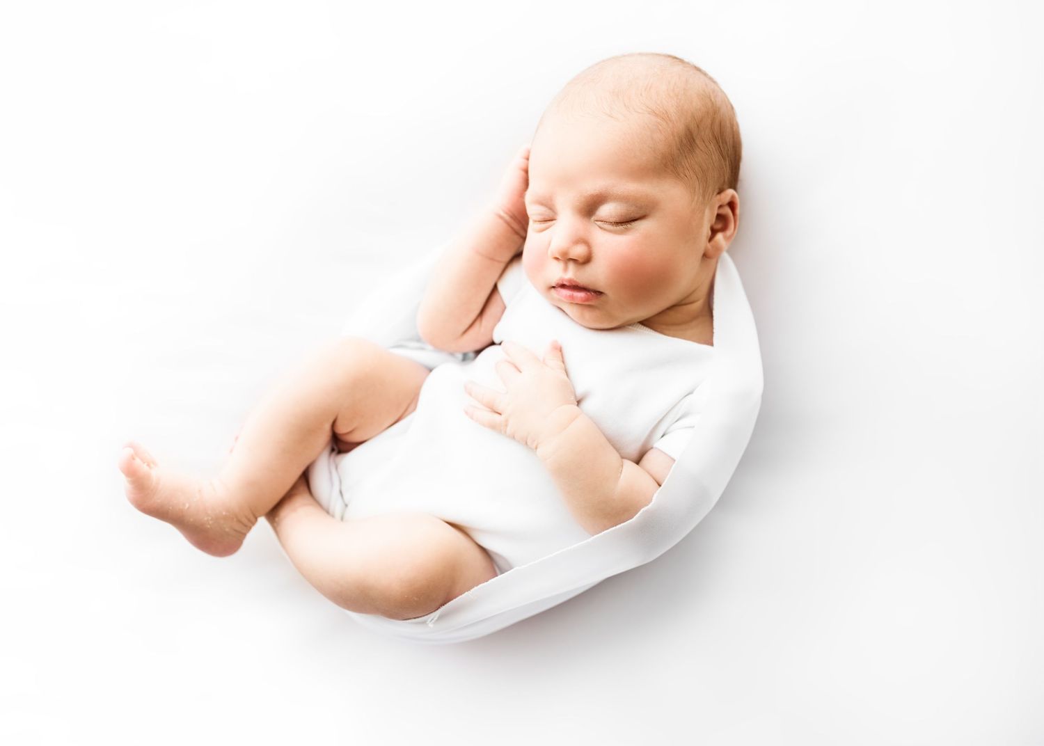baby lead photo shoot in all white studio