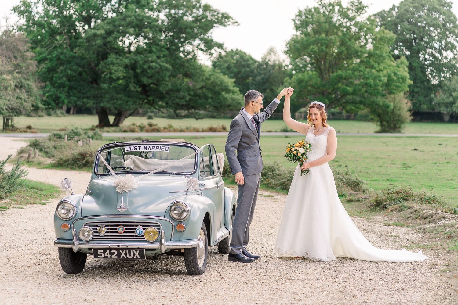 autumn wedding new forest vintage car morris minor