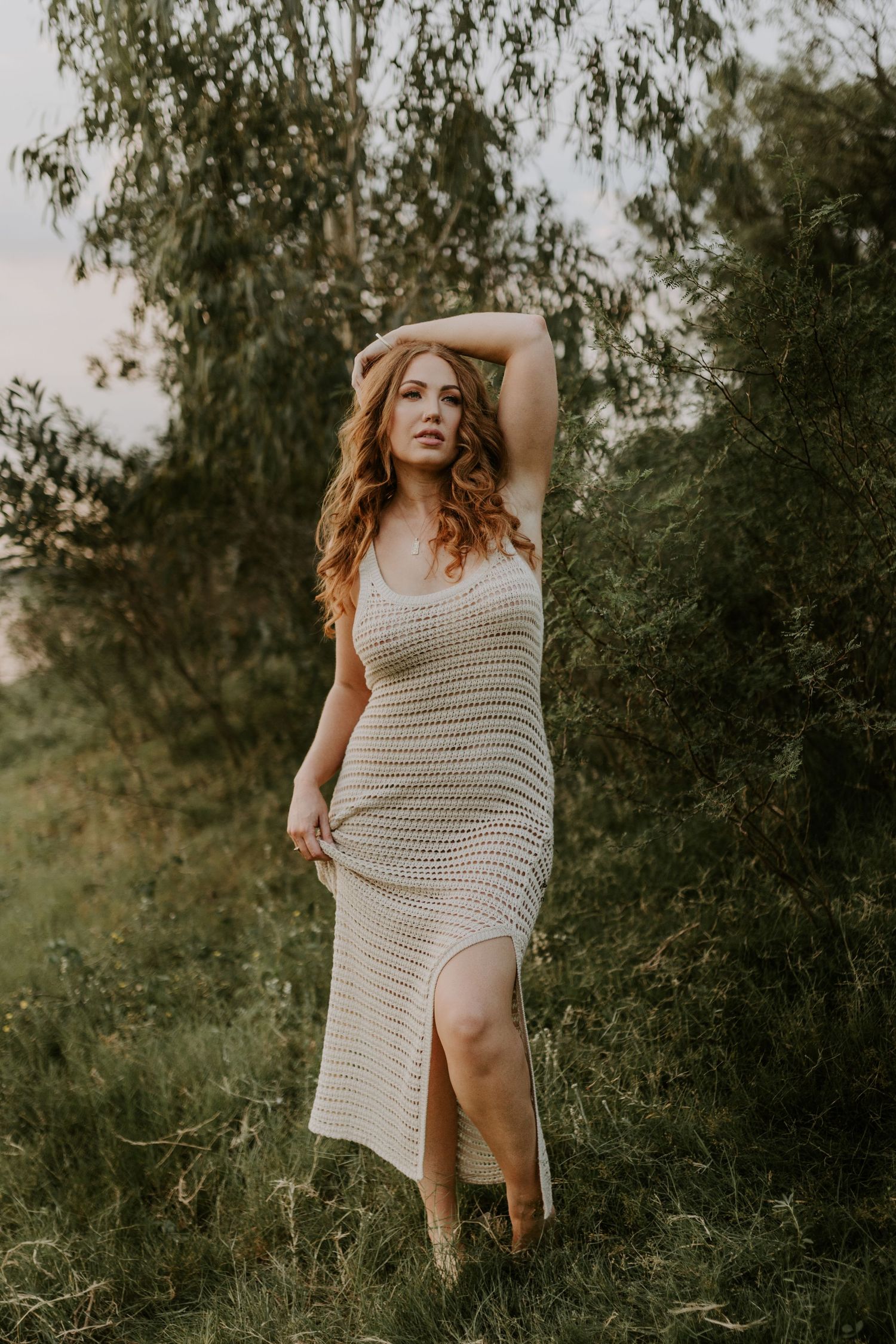 Woman standing amongst greenery at Lake Moondarra, Mount Isa