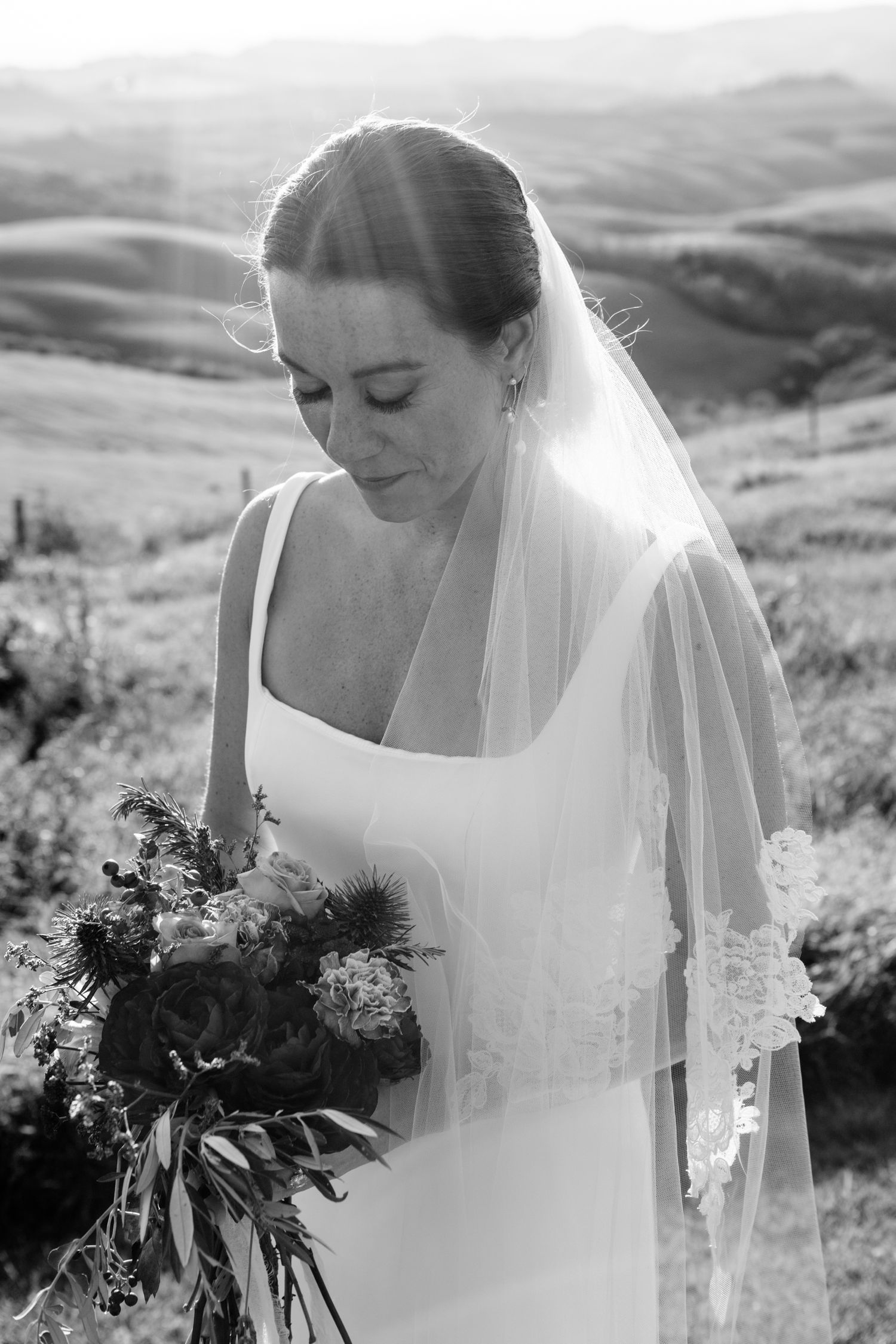 Romantic black and white portrait photography of a bride at her destination wedding in Tuscany