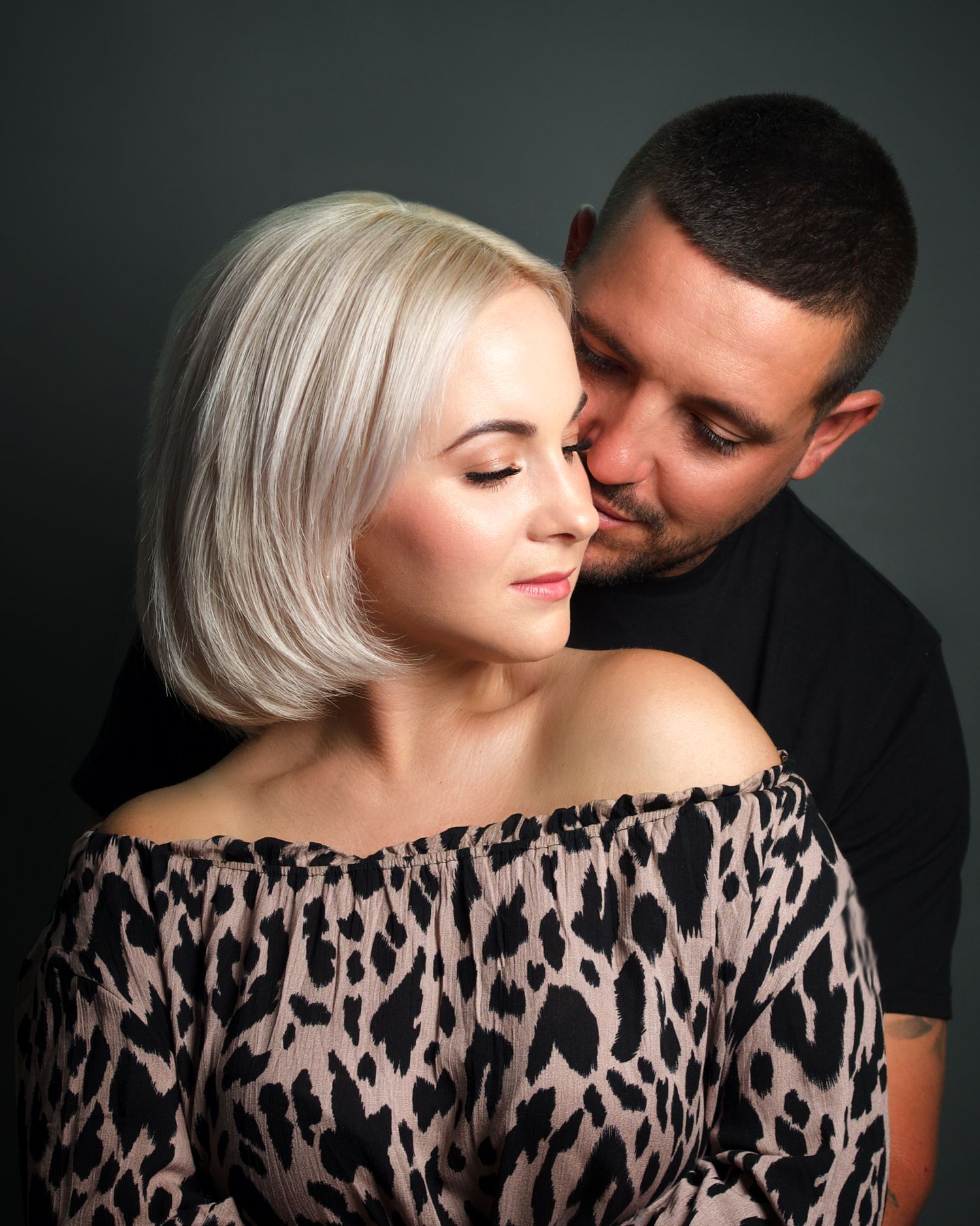 Mathew and Amber celerbrating 10 years marrige with a portrait showing their love to one another