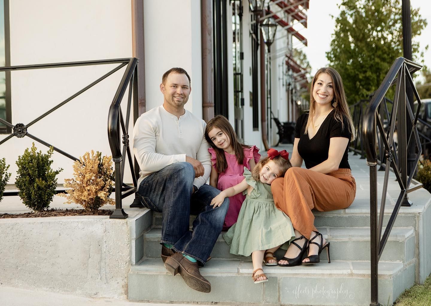 Outdoor family portrait photo.