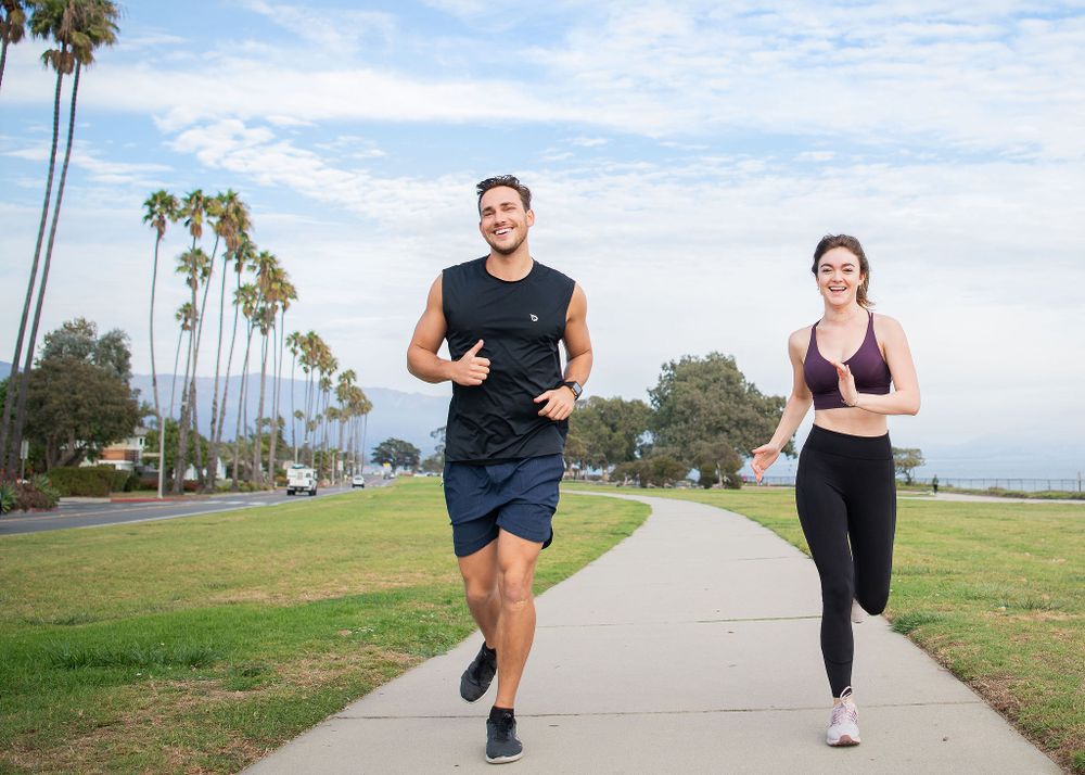 couple jogging together on the mesa in santa barbara ca