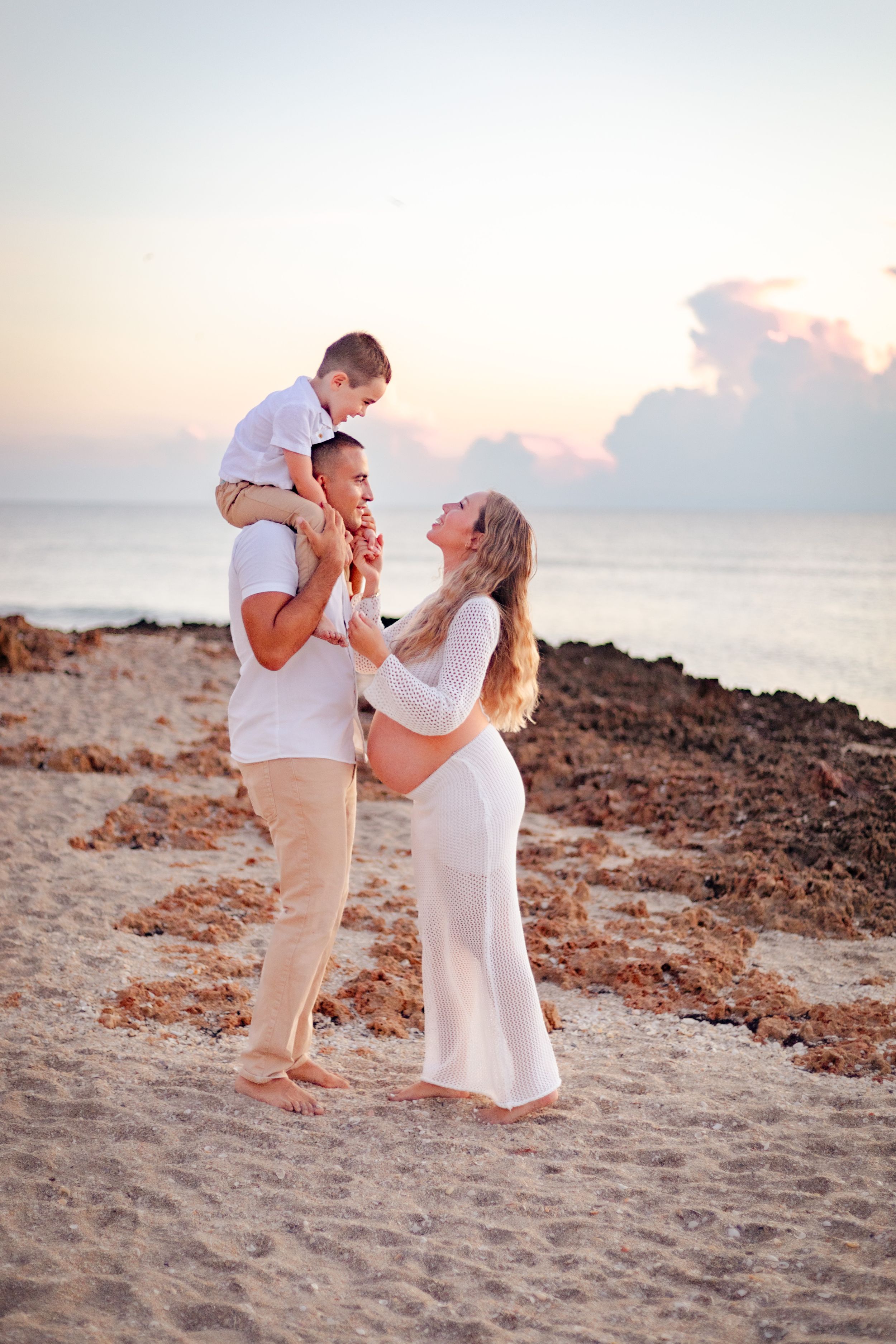 family beach maternity photo