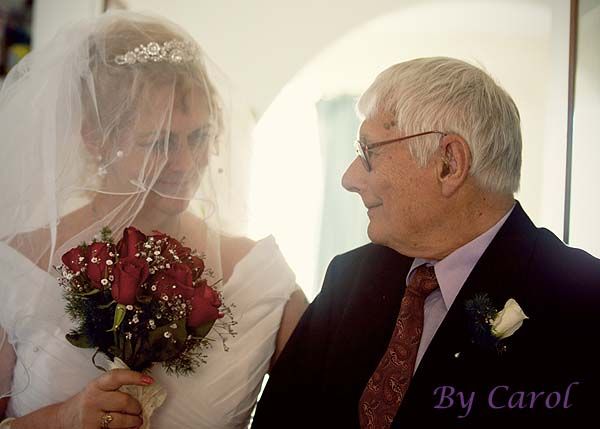 Wedding portrait session with elegant decor and soft lighting by photographer Carol.