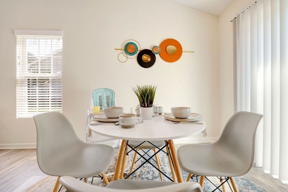 Air B&B photography capturing the dining room details of a home for rent in the NC Triad city of Greensboro.