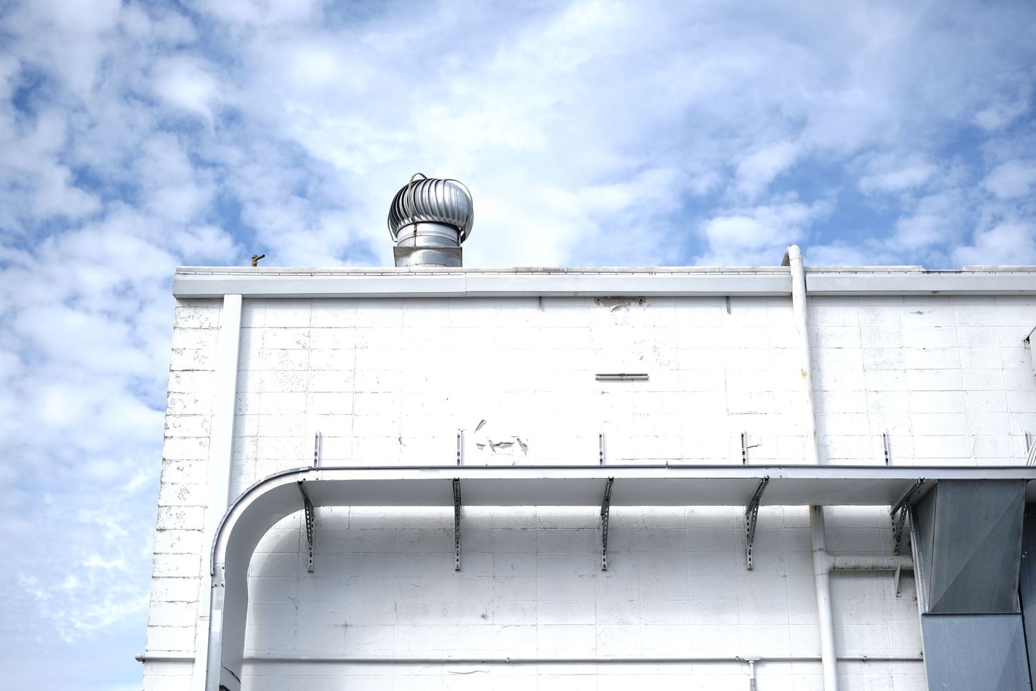 Mother's Brewing White Building