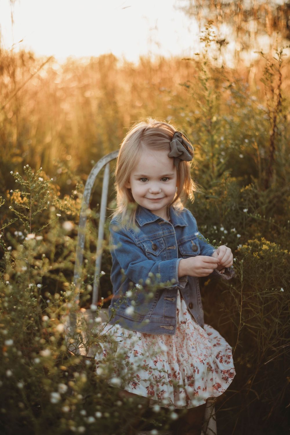 child photo, golden hour, sunset, in a field