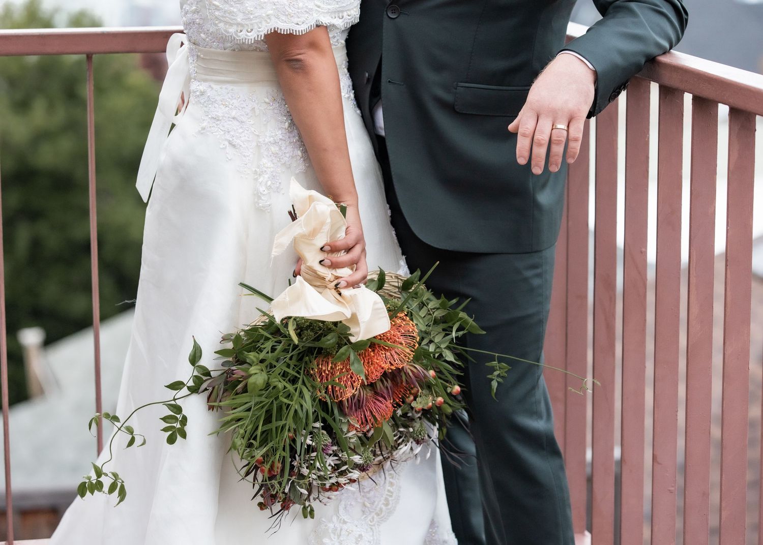Bride and groom with bride's wedding bouquet