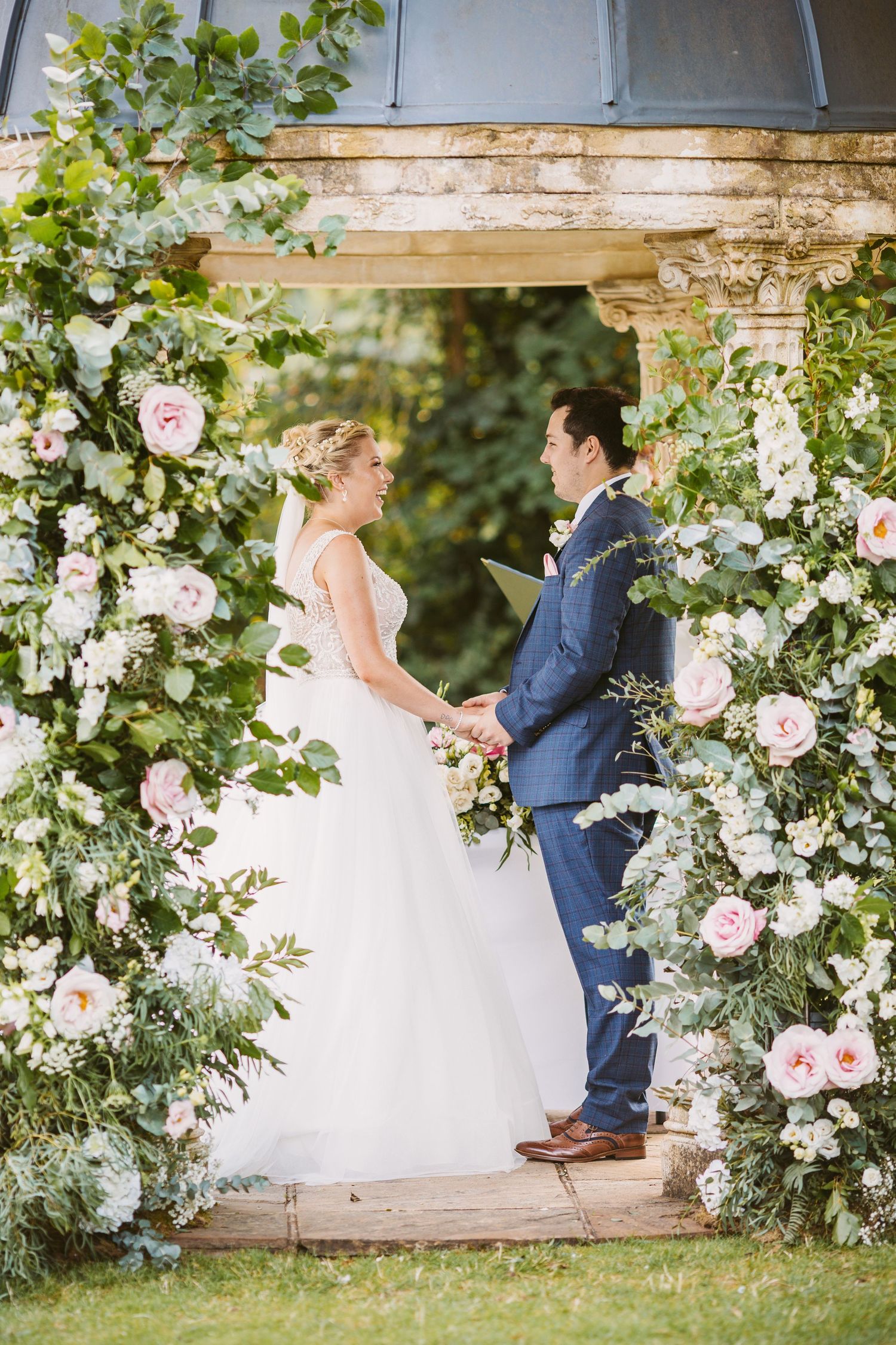 Outdoor ceremony at Ardington House under the Island Temple with floral arch display Ardington House Wedding photographer Vicky Lewis
