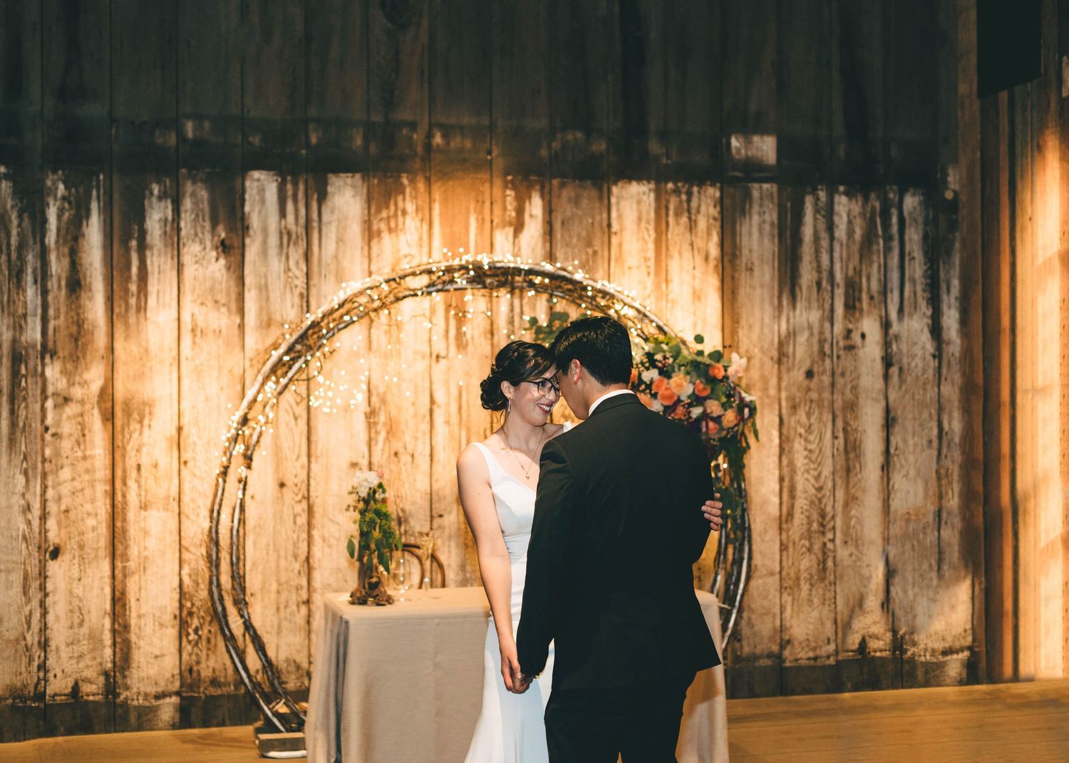 bride and groom sharing their first dance at the Barns at cooper molera in Monterey