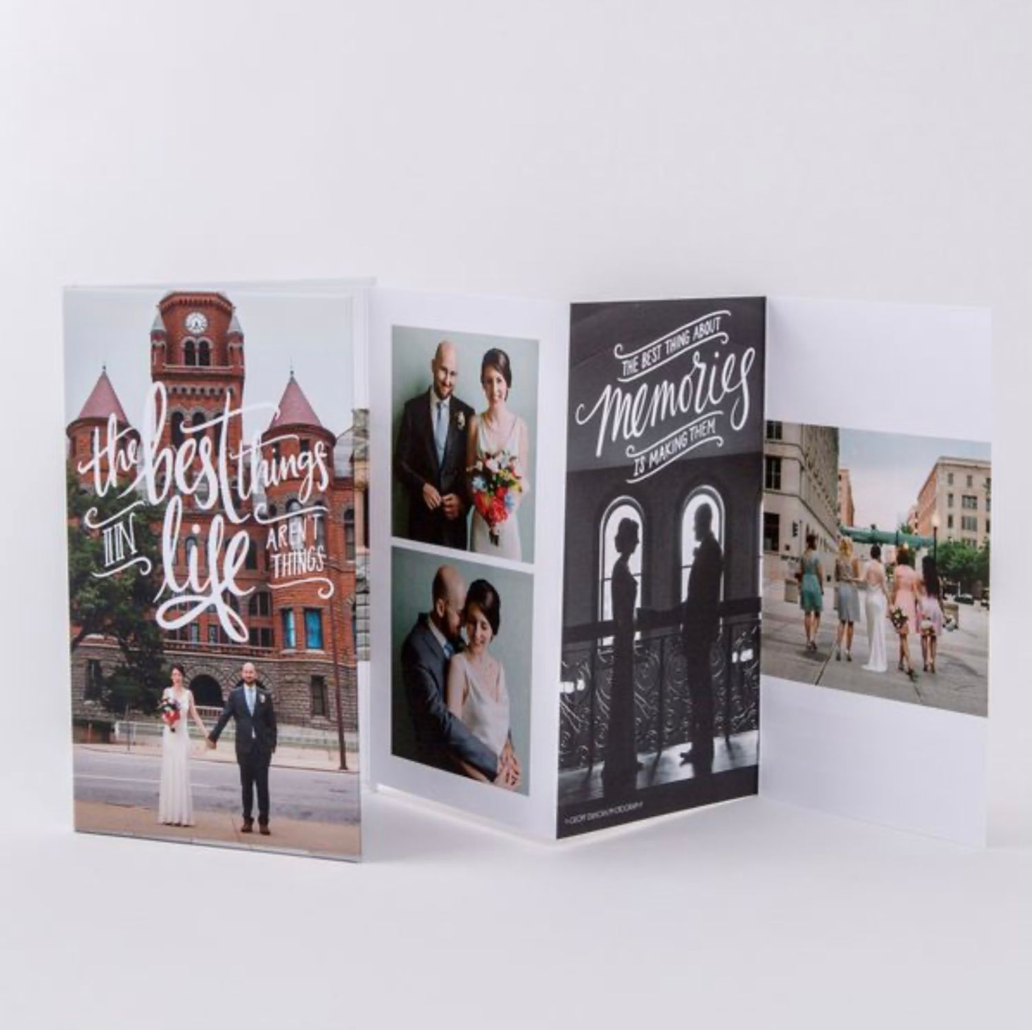 Collection of urban photography prints displayed in a row showing architecture and street scenes.