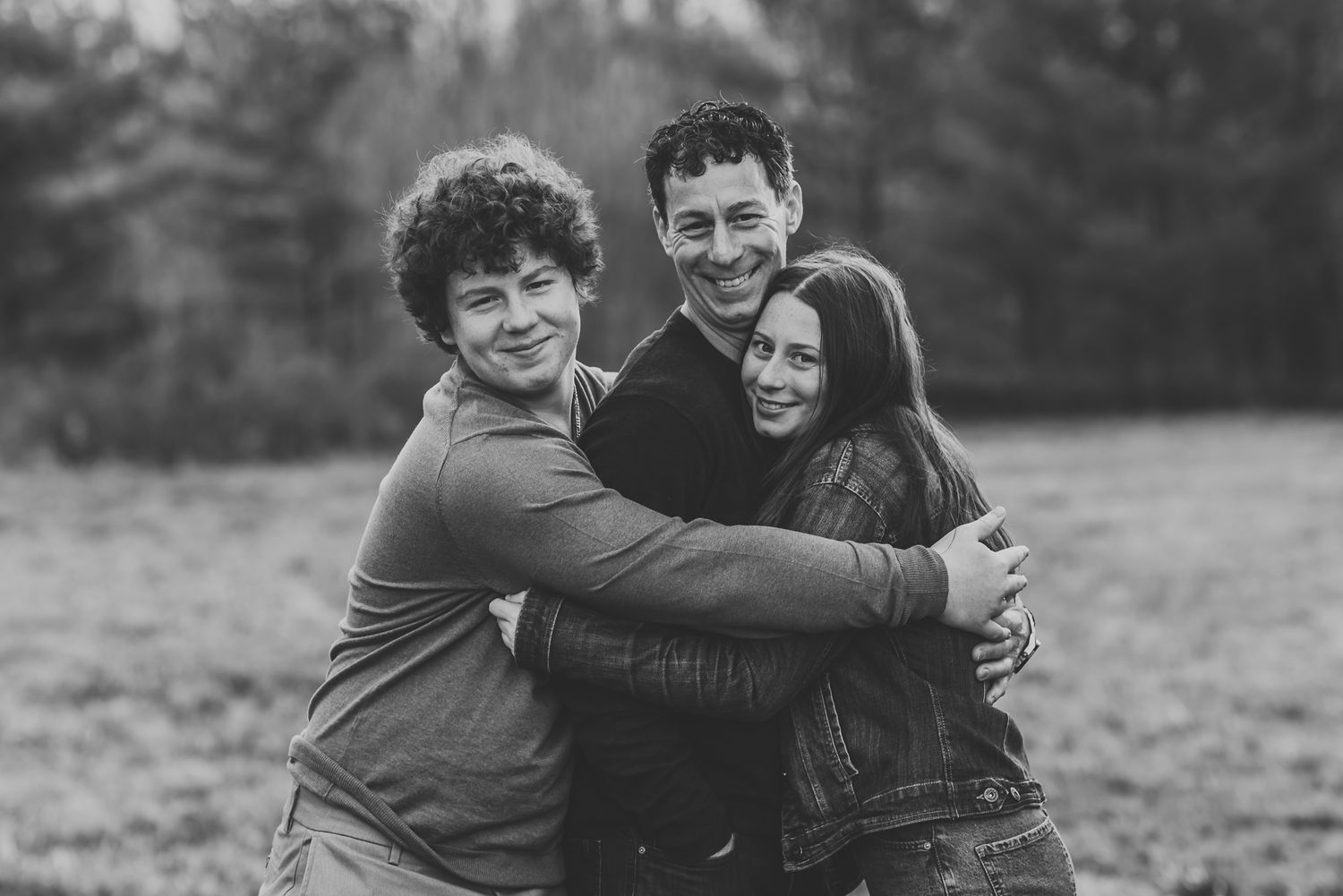 Father with kids hugging