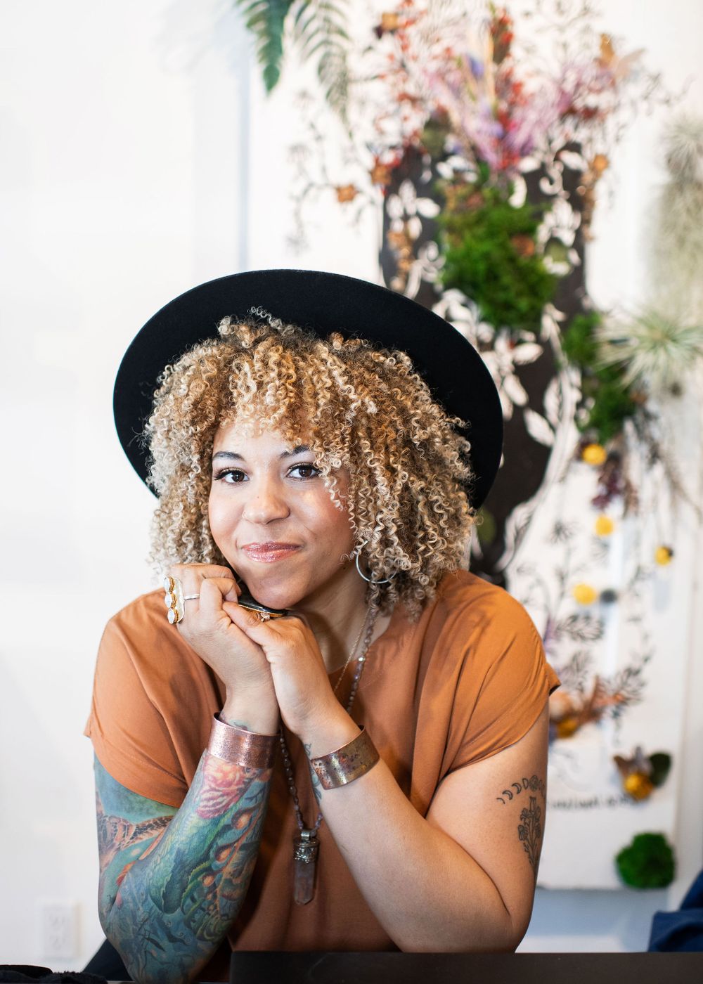portrait of ashe brown at pura luna apothecary