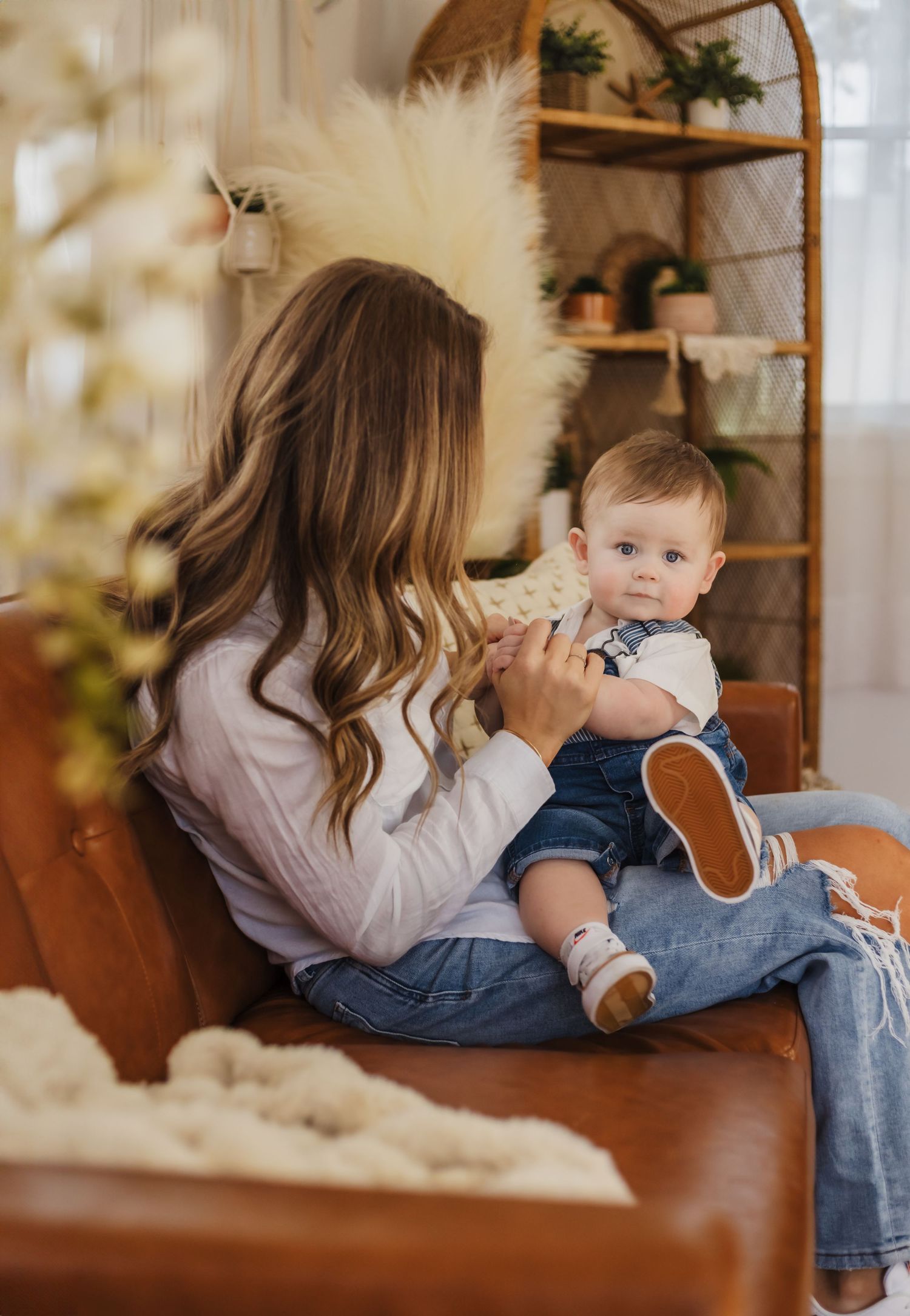 A relaxed lifestyle scene on a comfortable chair with soft natural lighting.