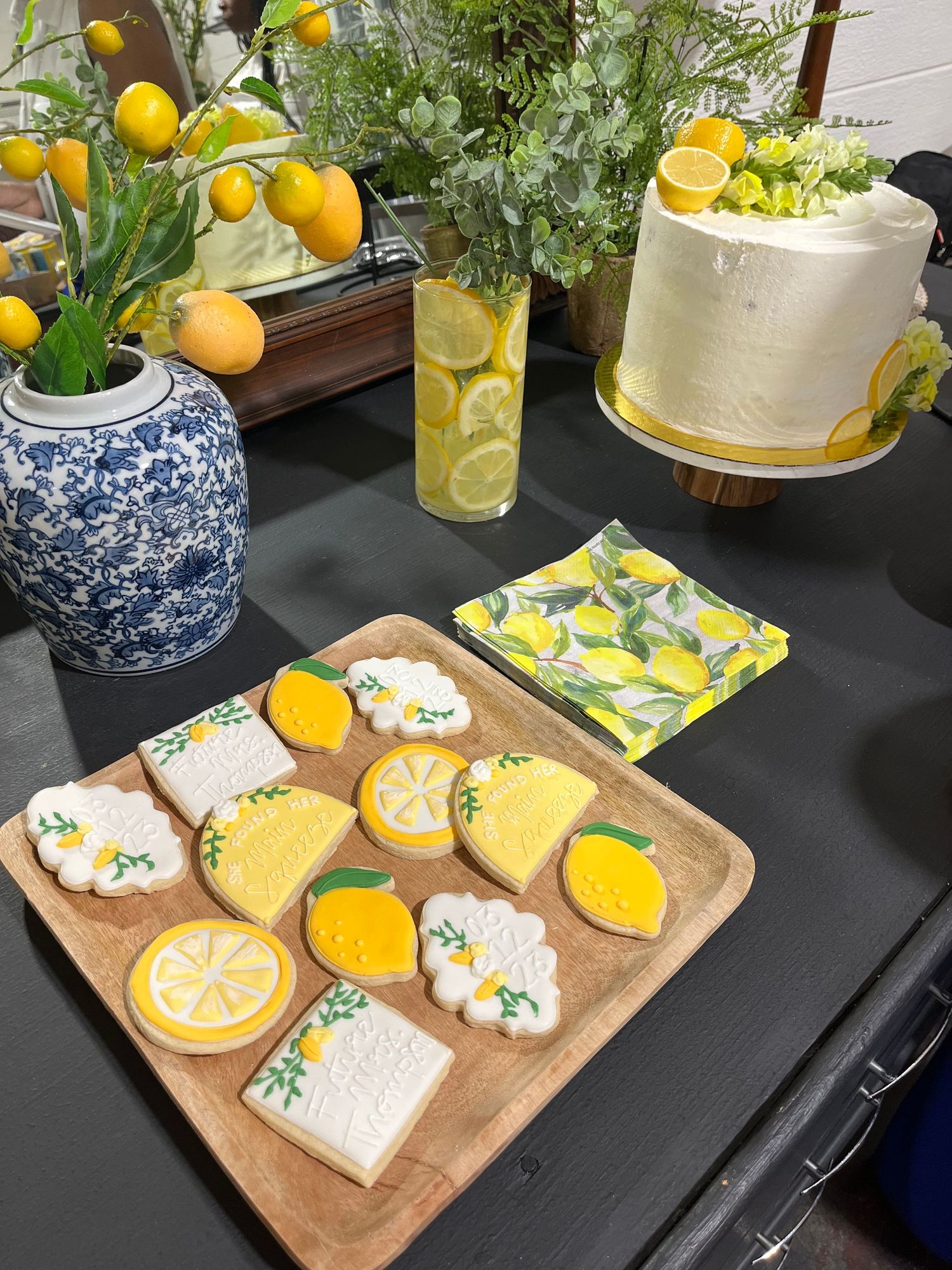 Lemon themed bridal shower cookies and cake.
