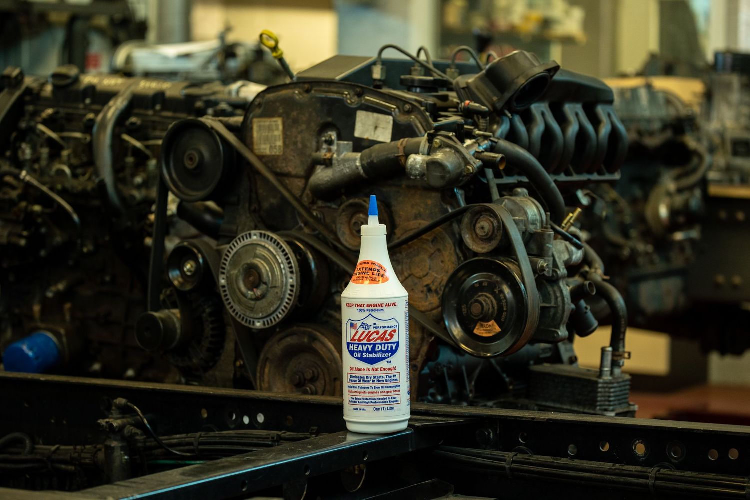 Lifestyle photo of a bottle of lubricant for motor vehicles