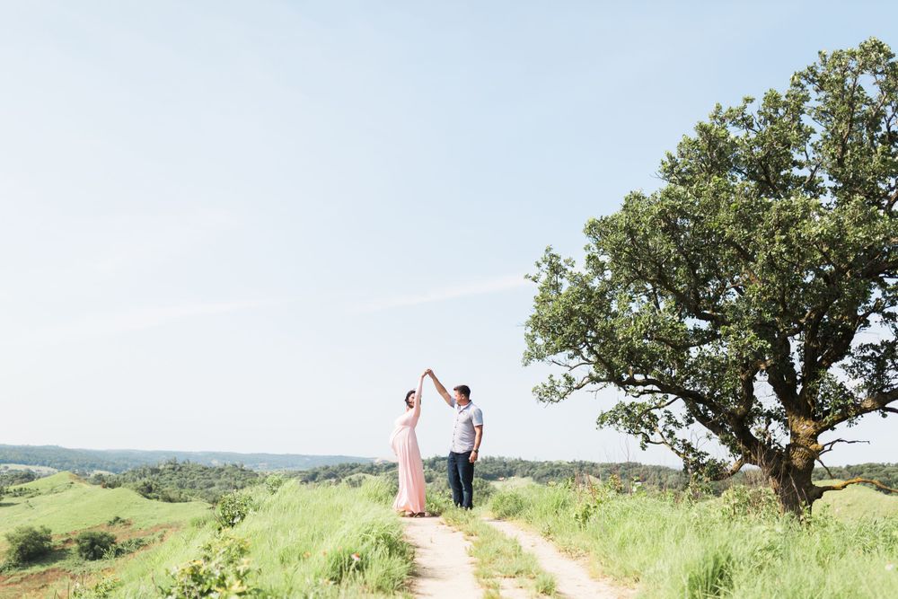 maternity photos at hitchock nature center, light airy iowa photographer, pink maternity dress, twirling maternity dress