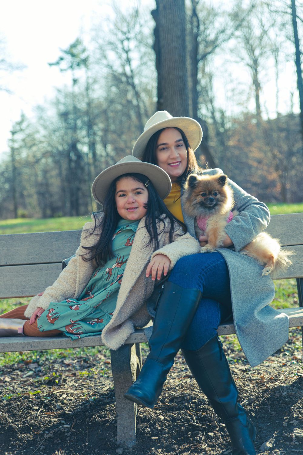 mom and daughter on park bench