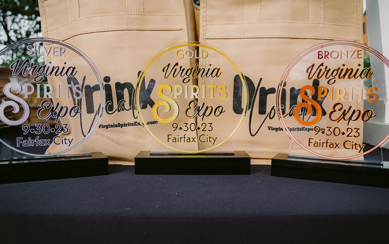 Three Virginia Spirit Expo event banners displayed at conference.
