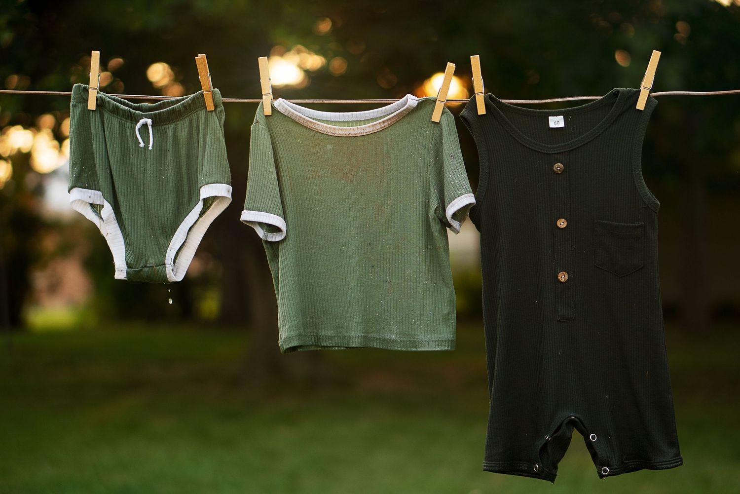 dripping clothes hang from line in nostalgic photo