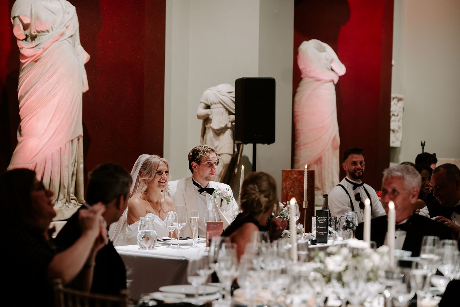 bride and groom listening to father of bride speech in the grand sculpture gallery at the Ashmolean Museum