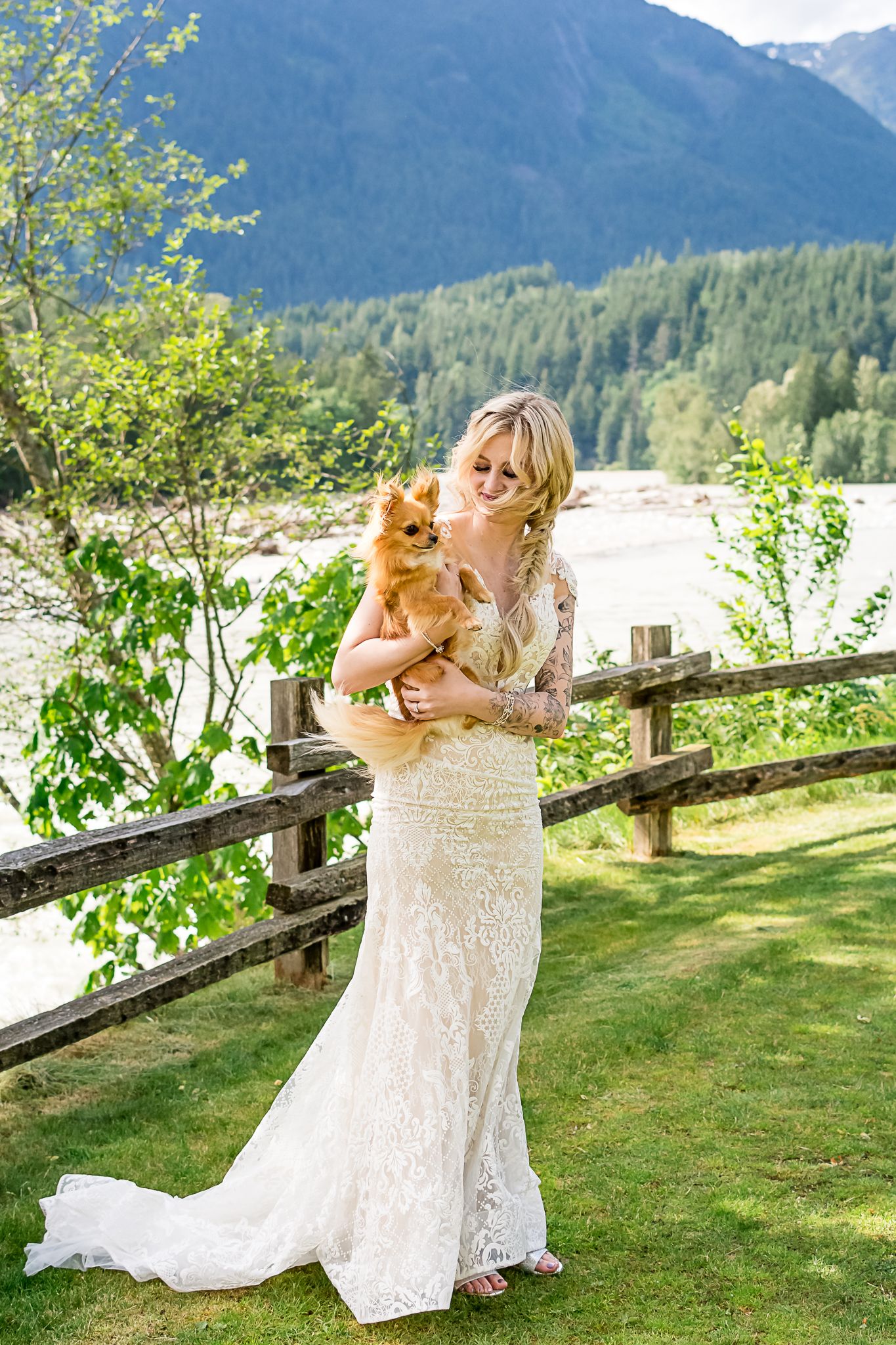 Beautiful bride with her cute furry dog. Taken at Hope Golf Course by Kari Mills Photography.
