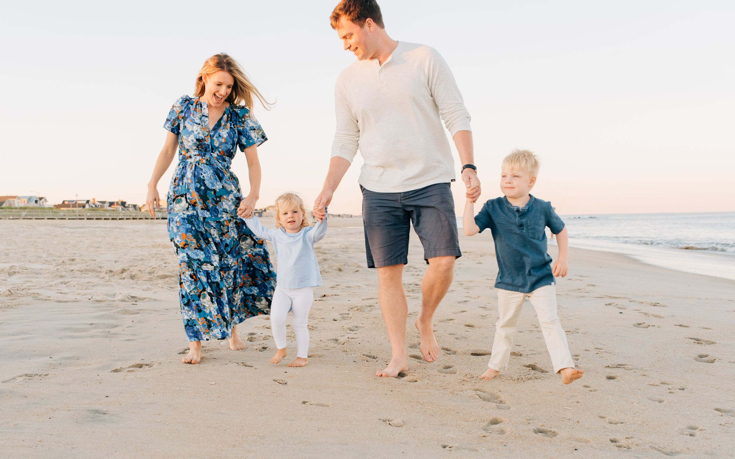 Lauren Marie Photography - Walking down the beach at Spring Lake NJ for a family photo session