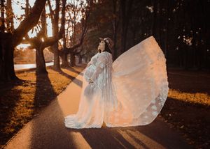 best-maternity-photographer-fort-wayne-indiana-beautiful-plus-size-pregnant-woman-sillouette-sunlight-through-trees