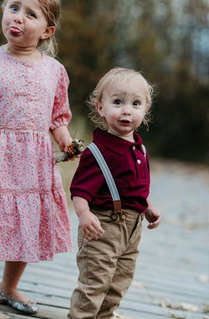 Two children pulling funny faces