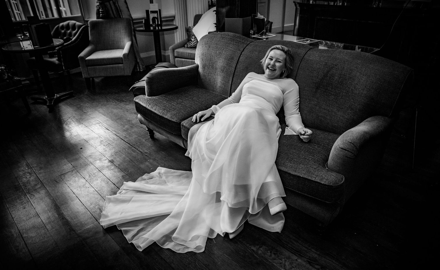 Bride relaxing on sofa