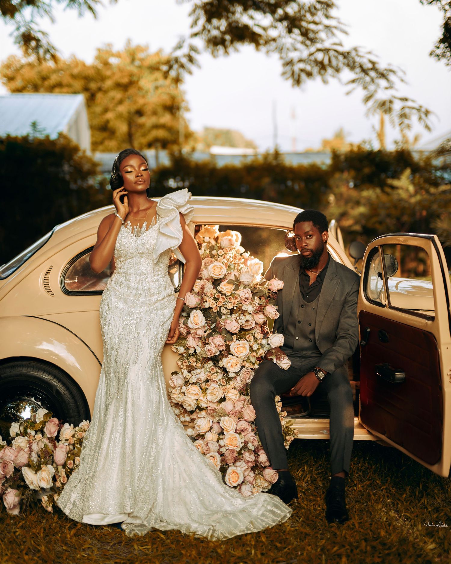 Stylized wedding shoot in Hamilton with minimalist backdrop and fashion-forward posing Nigerian white wedding ceremony photography