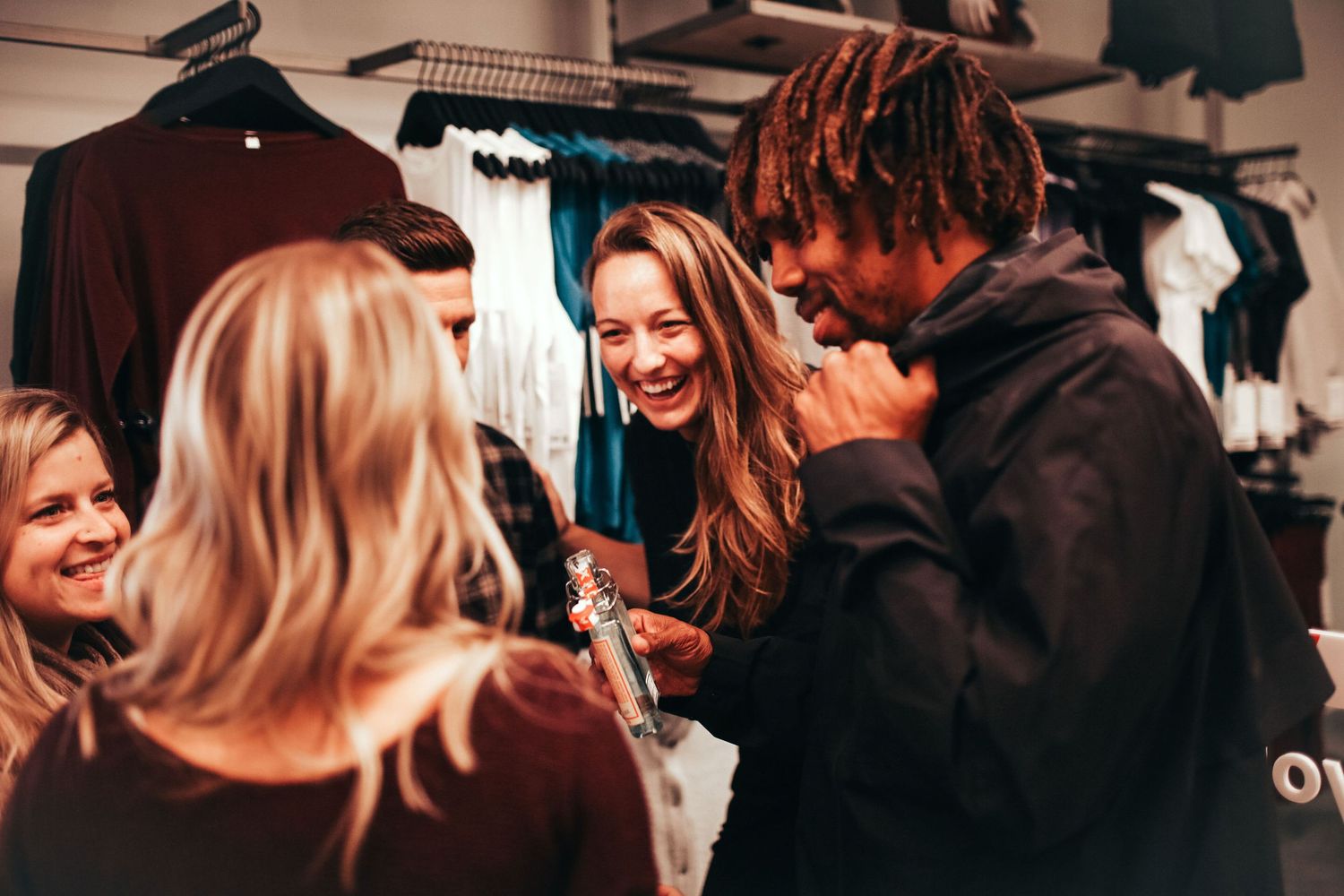 group laughing at indoor clothing event, lululemon, ambassador