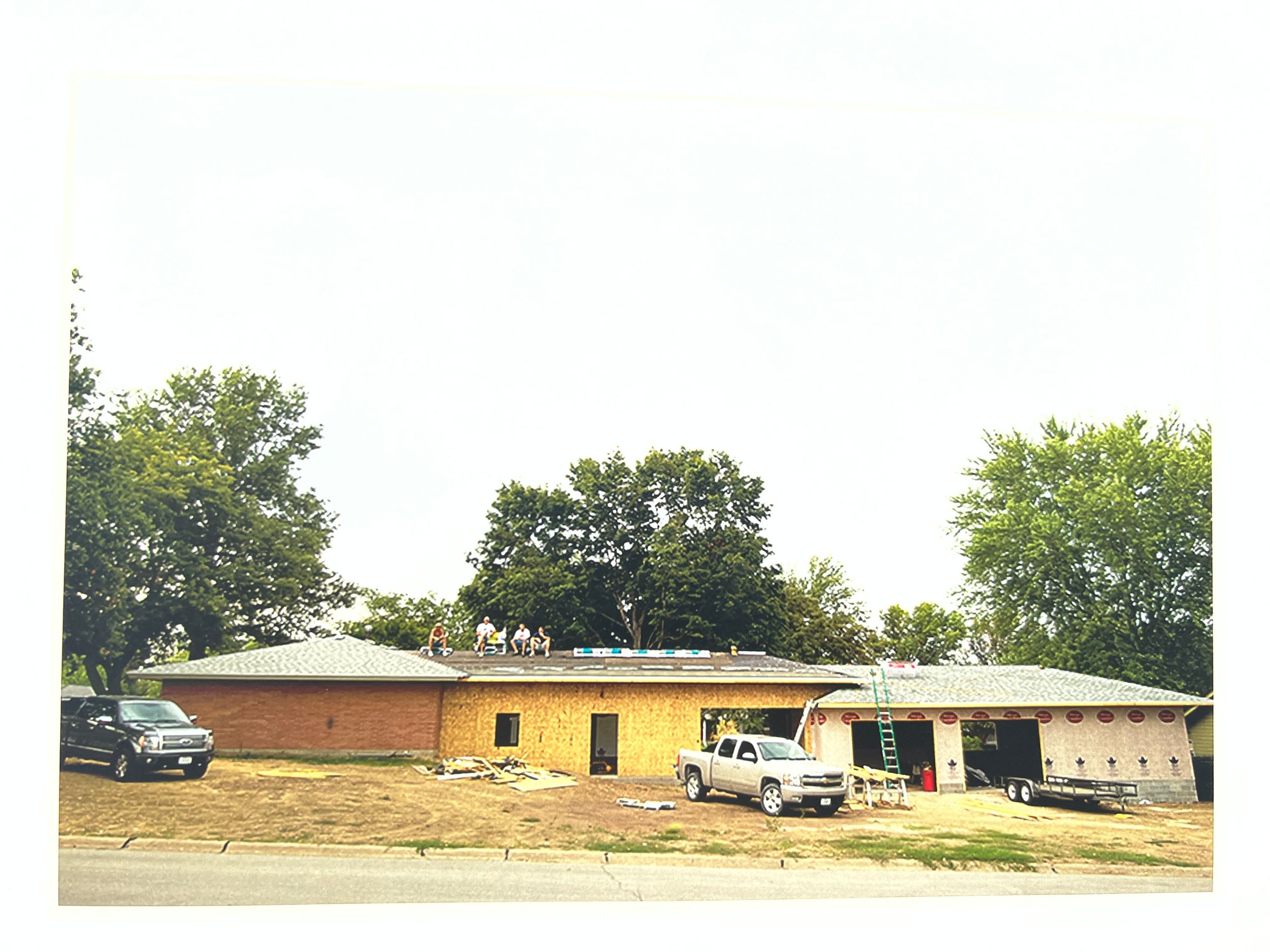 Panoramic view of a flat terrain with buildings visible in the distance.