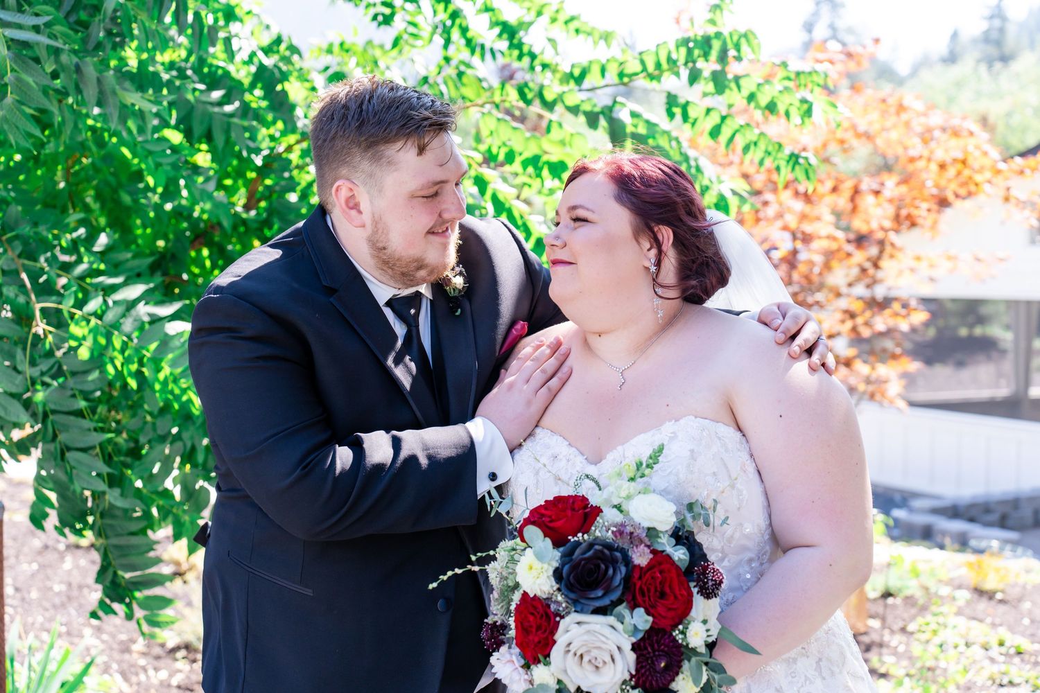 bride and groom look at each other