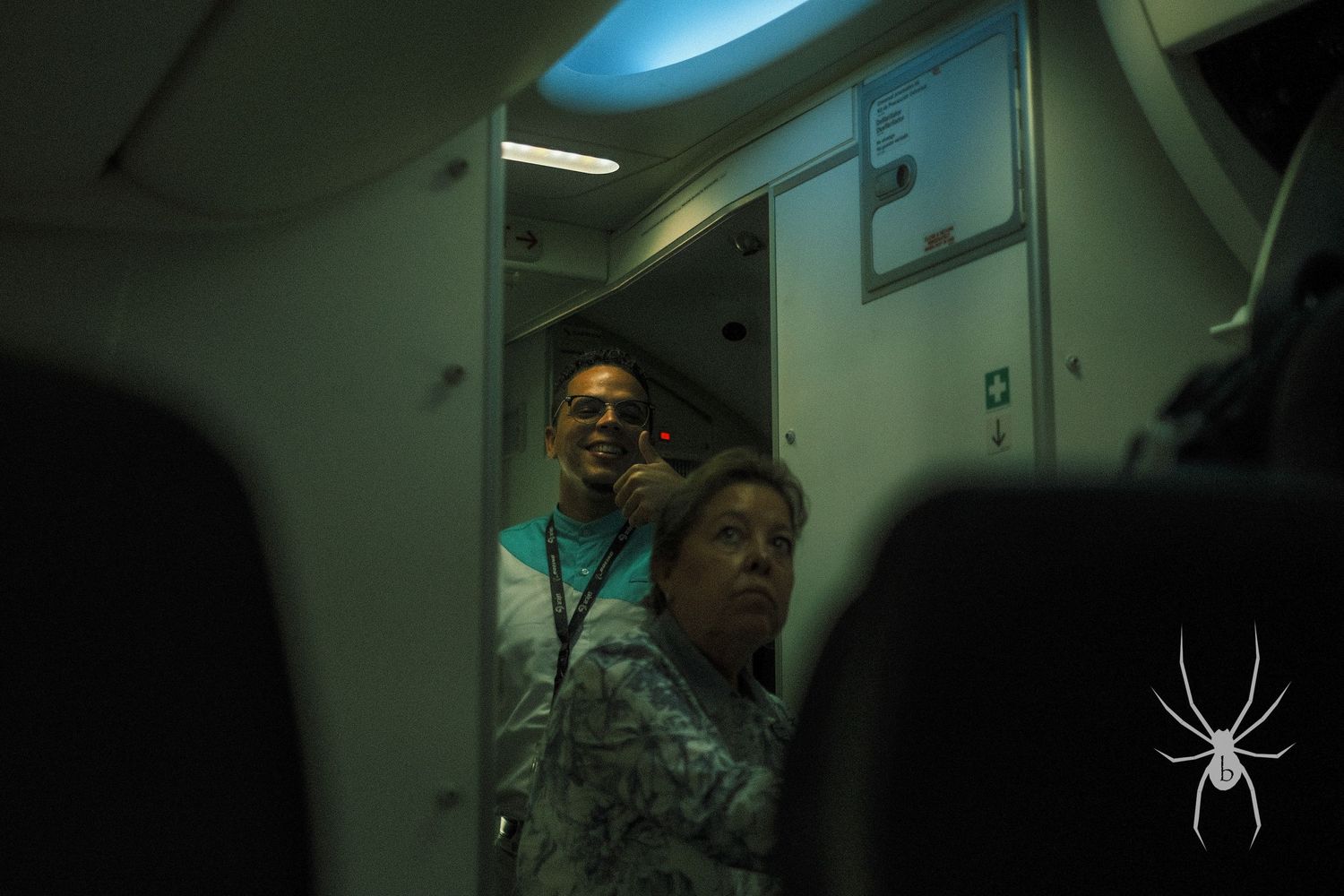 Dark interior shot of passengers on public transportation.