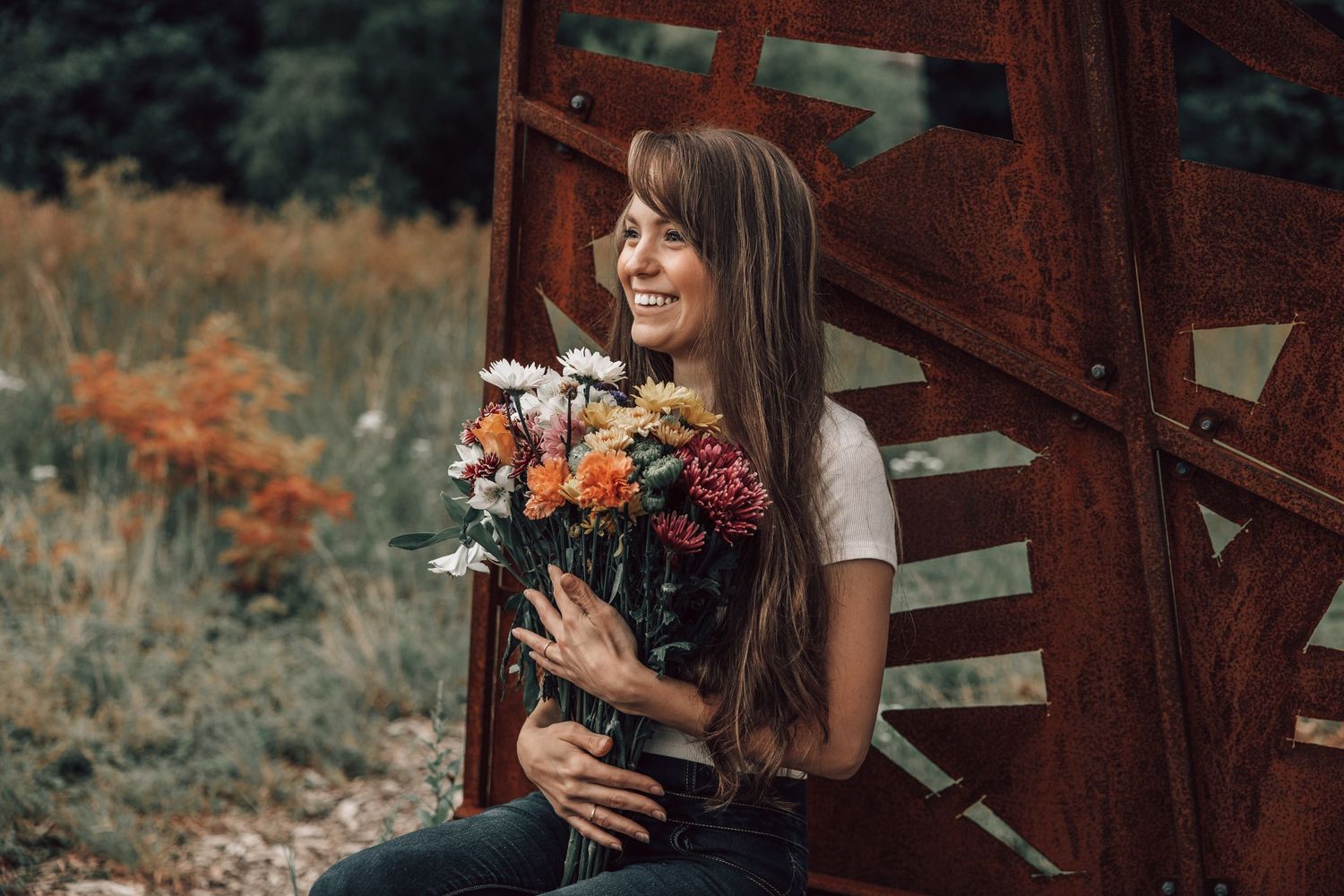 Beautiful girl sitting holding flowers west virginia