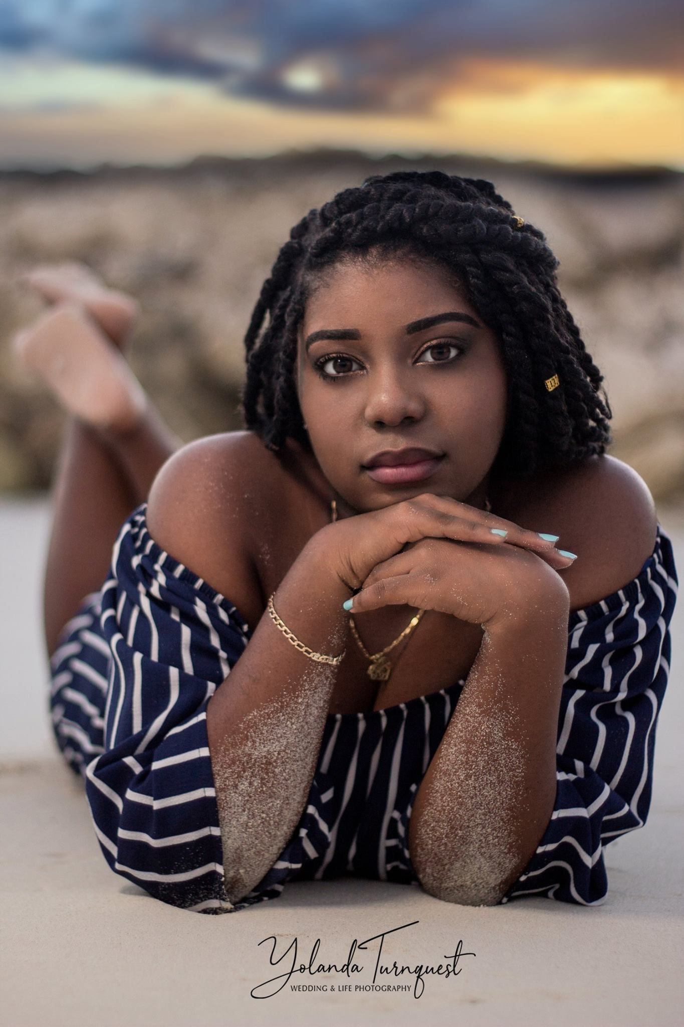 teen girl in sand on beach at sunset, nassau bahamas photographer, K. Yolanda Turnquest Photography