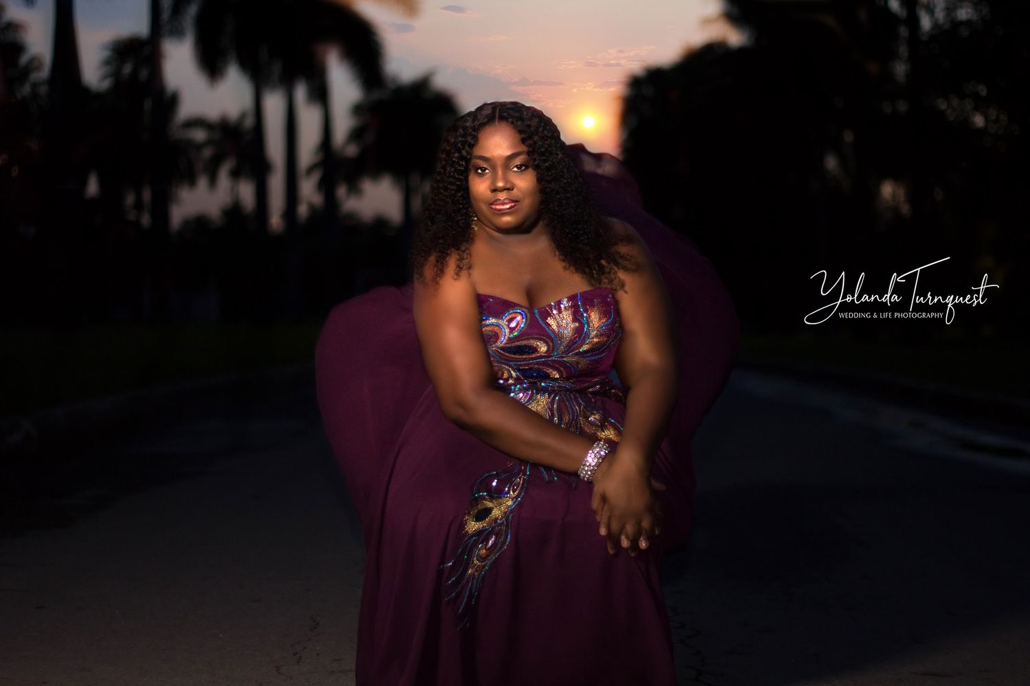 woman in purple dress blowing, nassau bahamas photographer, K. Yolanda Turnquest Photography