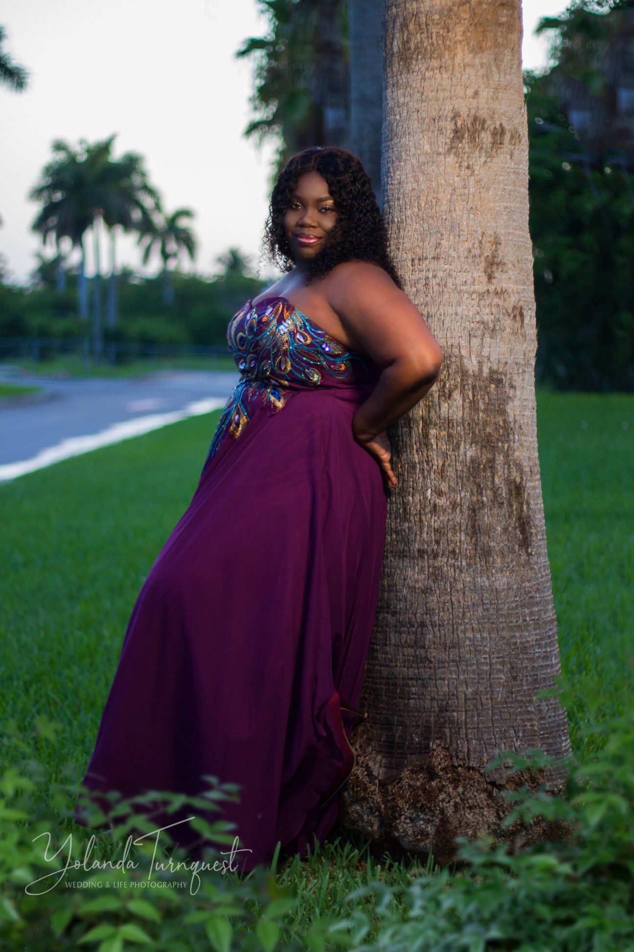 woman in purple dress leaning on tree, nassau bahamas photographer, K. Yolanda Turnquest Photography