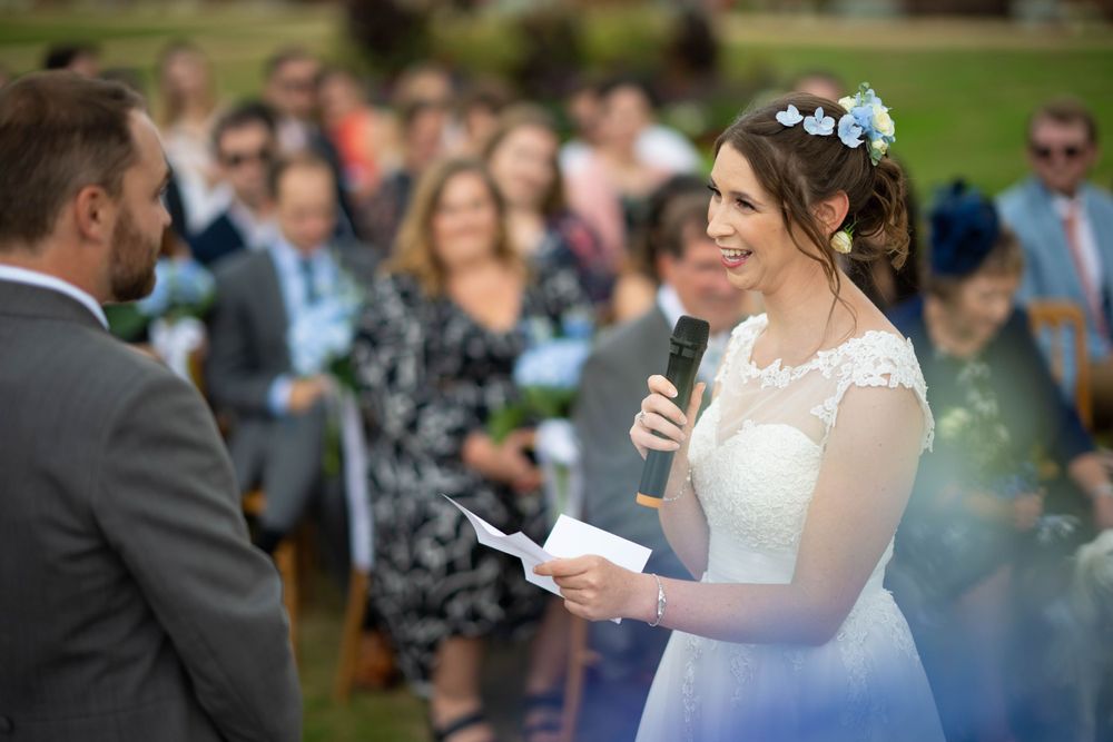 wedding vows outside in the garden at the elvetham hotel