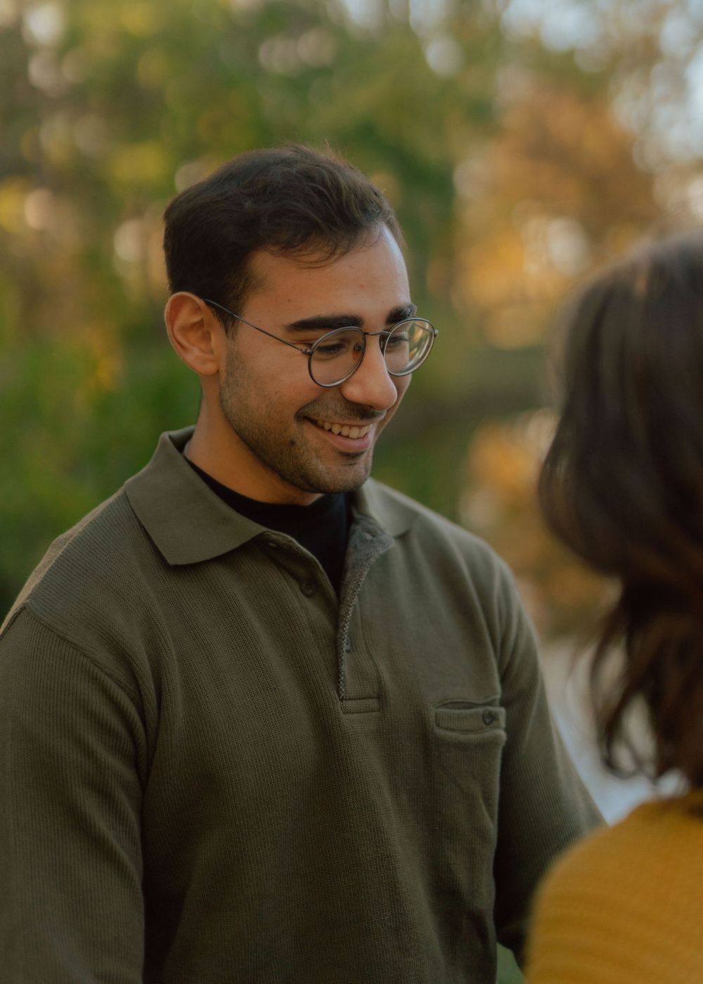 Warm autumn portrait in natural outdoor setting.