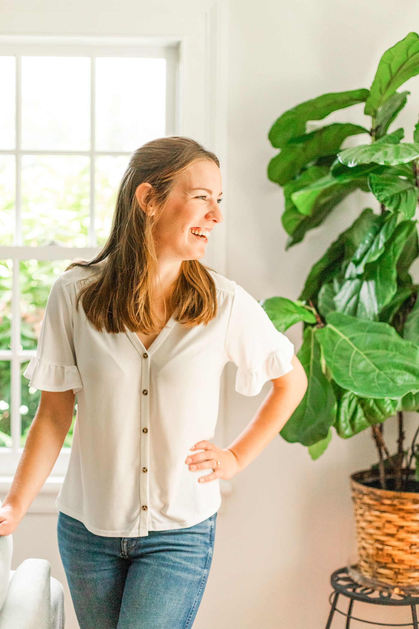 Woman smiling wearing a white shirt during a Hudson Valley Brand Session with Danielle Lauren Photography