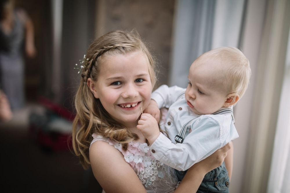 A sweet moment captured during what appears to be a special occasion or celebration.