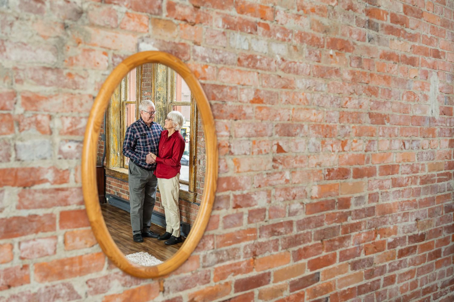 Portrait of grandparents in the mirror.