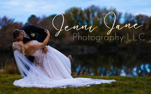 A romantic sunset photoshoot by a lake with a flowing white dress.