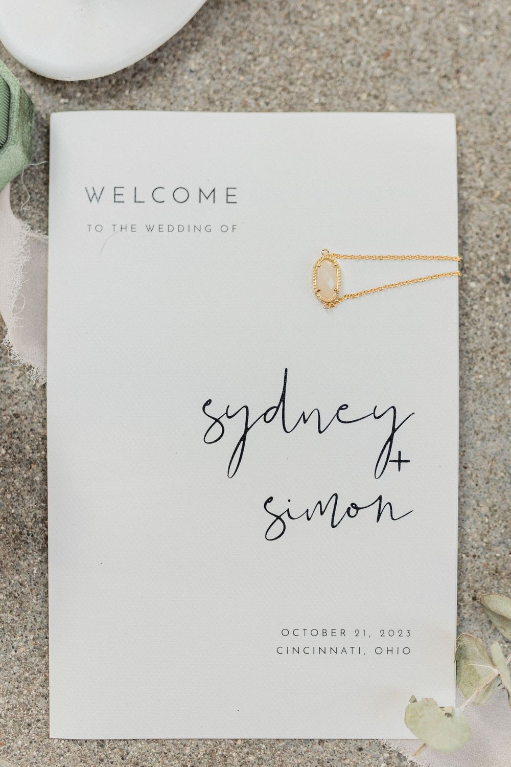 Modern minimalist wedding welcome card for Sydney and Simon's October wedding in Cincinnati.