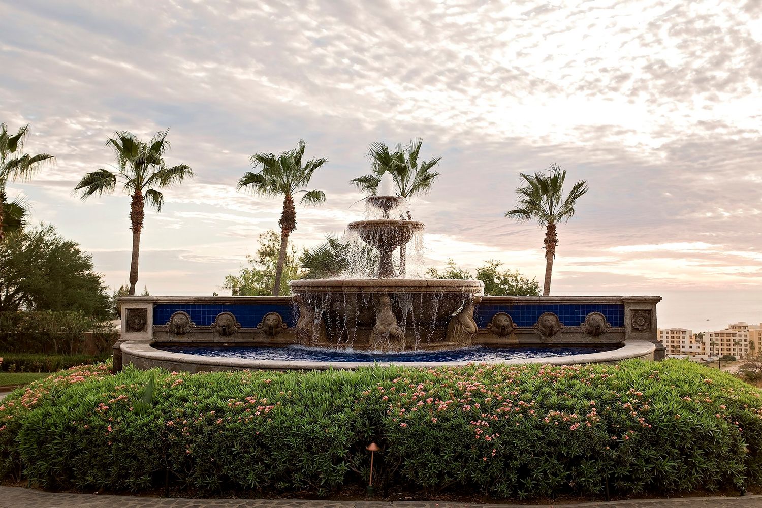 A large, ornate fountain located along the Northwest perimeter of the property. Accented with cerulean blue tiles, this